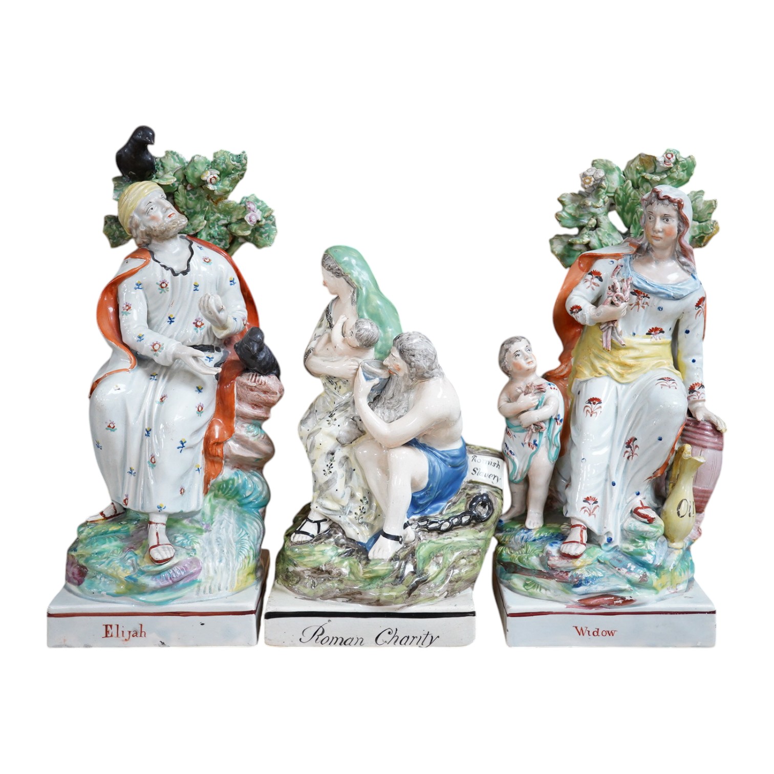 A pair of Ralph Wood II Staffordshire pearlware figures, ‘Widow’ and ‘Elijah’, c.1790-1800 an early 19th century pearlware group ‘Roman Charity’, (3) tallest 28cm. Condition - fair to good